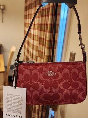 Coach Nolita 19 wristlet in signature red denim. 